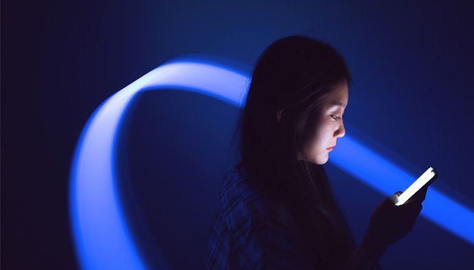 woman-on-phone-690x393